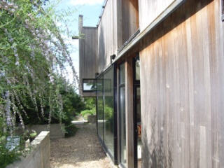 new cedar-clad house, view into garden